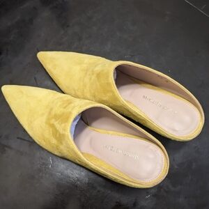 Stuart Weitzman Mules in Yellow